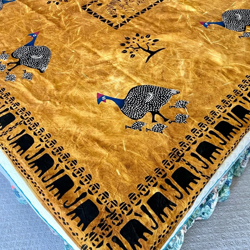 New from South Africa hand decorated table cloth with bird and elephant design.